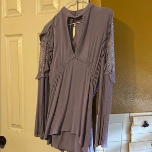 Elegant Purple Women's Top pit to pit is 18 1/2.